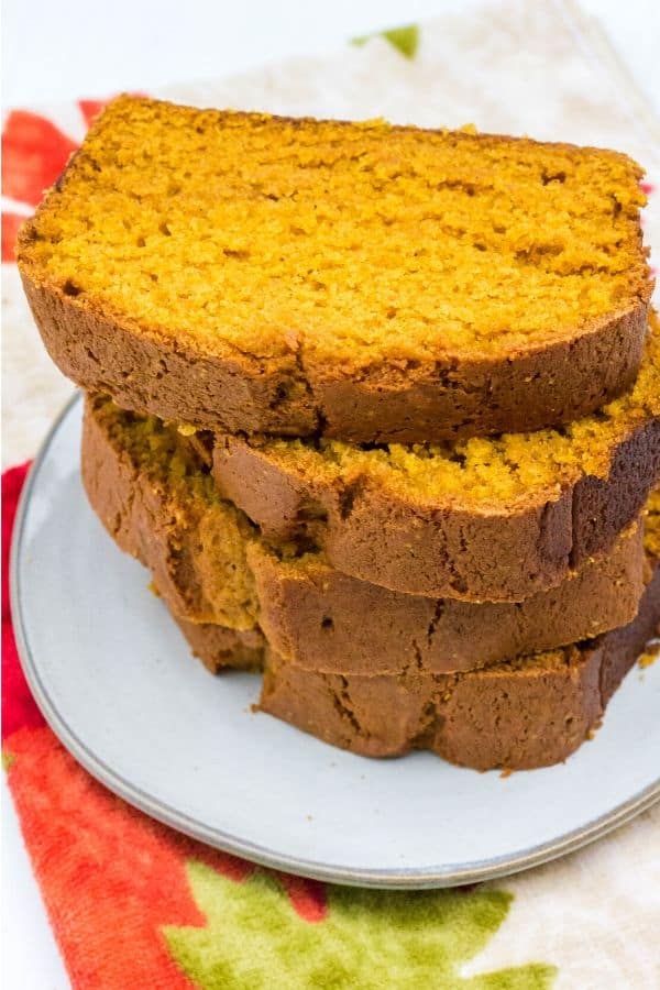 stack of four slices of pumpkin bread