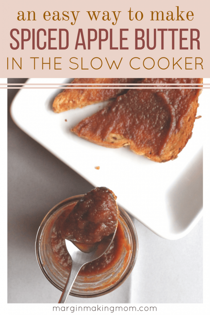 This slow cooker apple butter is the perfect blend of fall spices and sweet apples. Making it in the slow cooker makes it so easy! It is perfect on top of toast, English muffin bread, biscuits, rolls, or scones! Slow Cooker Apple Butter | Homemade Apple Butter | Easy Apple Butter | Thanksgiving Recipes