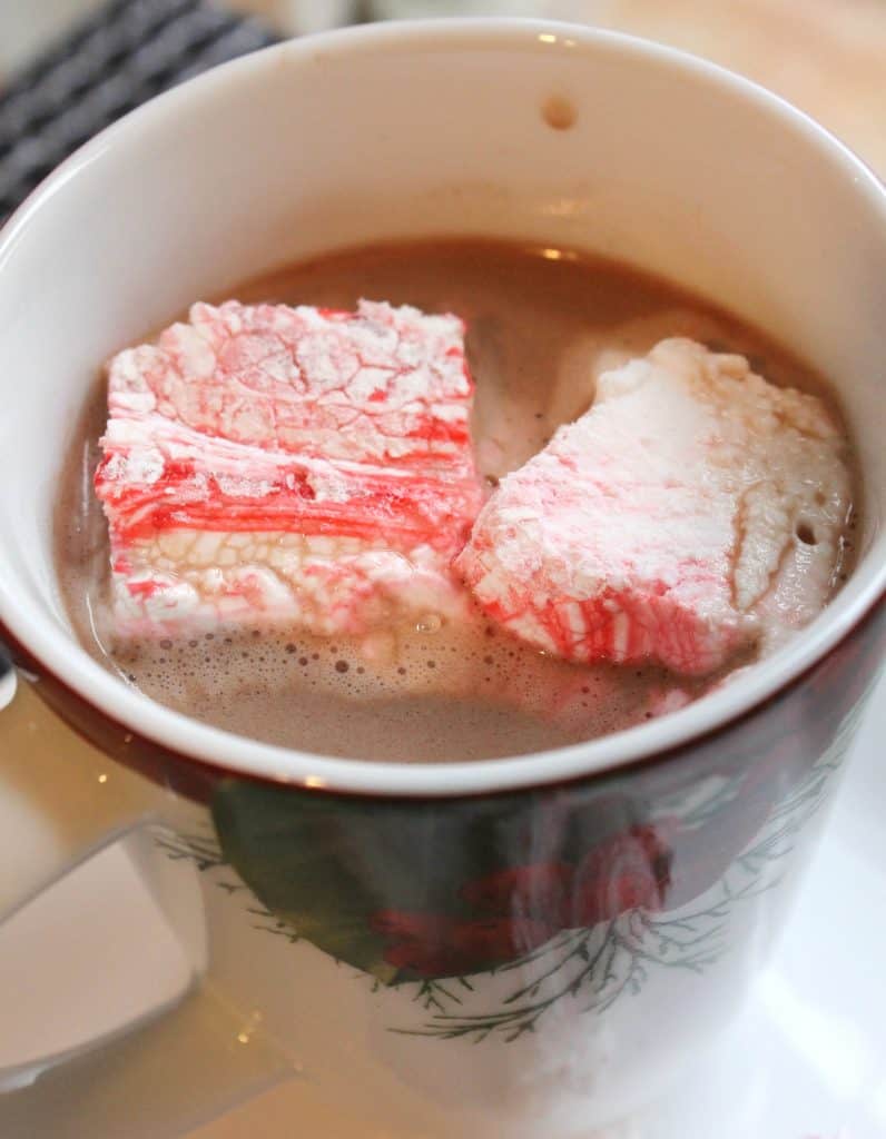 These peppermint swirl marshmallows are a pretty and tasty way to dress up a cup of cocoa or coffee! They also make a lovely inexpensive handmade gift! They only require a handful of ingredients and no corn syrup!