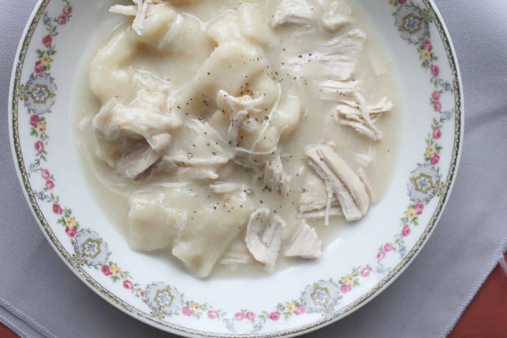 prsesure cooker chicken and dumplings in a white china plate