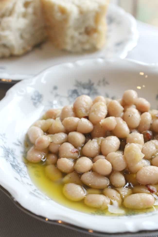 This irresistible Italian white bean dip is just as good as the white beans at Supper NYC! A super simple appetizer guaranteed to please. Click through to learn how to make it!