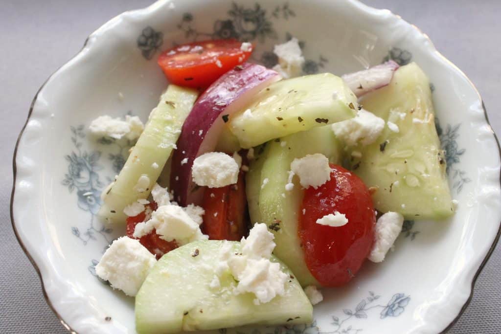 This deliciously simple cucumber salad is a wonderful way to utilize summer's bounty of produce! It's a frugal and easy side item that is sure to please. Click through to learn how to make it!