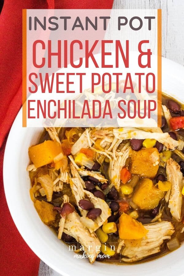 white bowl filled with Instant Pot chicken and sweet potato enchilada soup