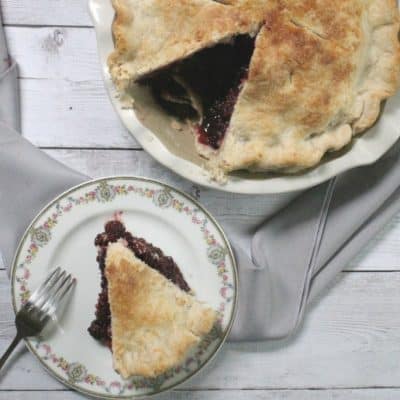 This deep dish blackberry pie is chock full of bursting berries--it's the perfect way to harness the sweetness of summer's berry bounty!