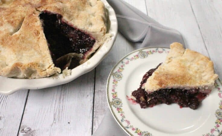 This deep dish blackberry pie is chock full of bursting berries--it's the perfect way to harness the sweetness of summer's berry bounty!