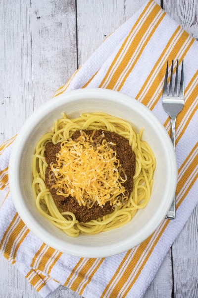 white bowl filled with spaghetti and cincinnati chili made in the Instant Pot