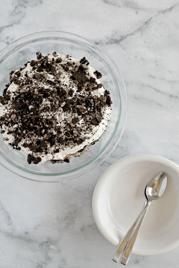 This chocolate Oreo cream dessert is absolutely heavenly! Layers of sweetened mascarpone cream are paired with chocolate mousse and crushed Oreos, resulting in a dreamy and decadent dessert that is impressive yet easy to make!