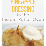 pineapple dressing on a china plate and topped with whipped cream