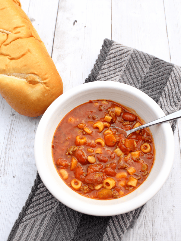 Making this pasta e fagioli in the Instant Pot lets you get a delicious dinner on the table in a flash! Beef, beans, and pasta are simmered in a flavorful tomato broth, creating a hearty soup your family will love. If you don't have an Instant Pot, you can follow the stove top directions.