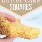 A woman's hand holding an ooey gooey butter cake square with a bite taken out of it