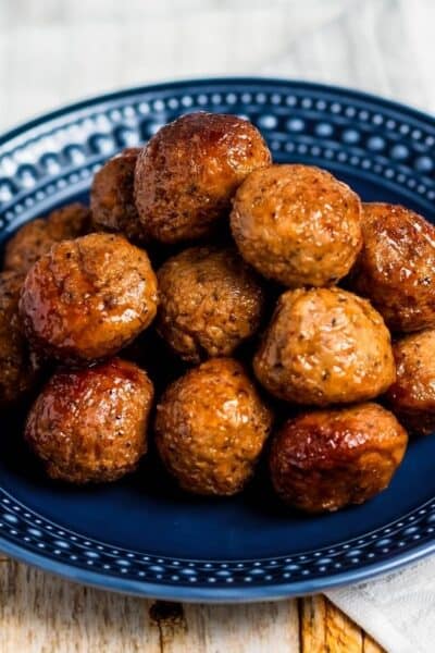 Instant Pot cocktail meatballs on a blue plate