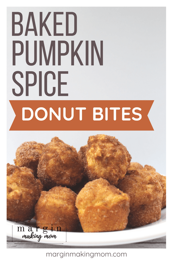 White plate piled with several pumpkin donut holes