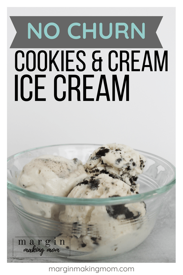 clear glass bowl with three scoops of cookies and cream ice cream