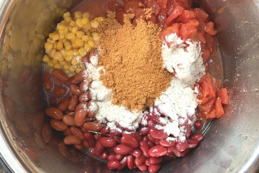 ingredients for taco soup in the insert pot of the Instant Pot
