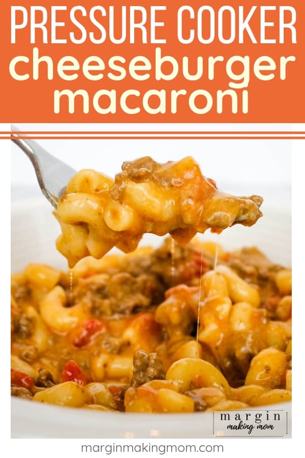 instant pot cheeseburger macaroni being lifted out of a bowl on a fork