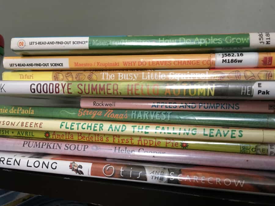 stack of kids books about fall