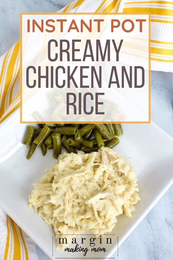 white plate with chicken and rice and green beans