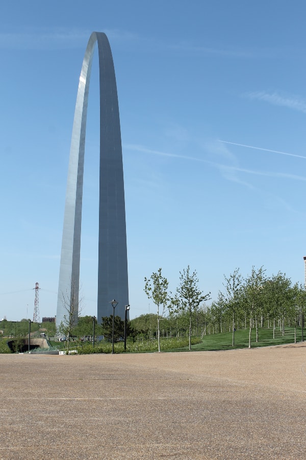 gateway arch surrounded by trees and grass