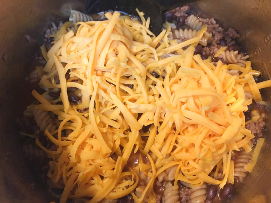 adding cheese to enchilada pasta in the instant pot