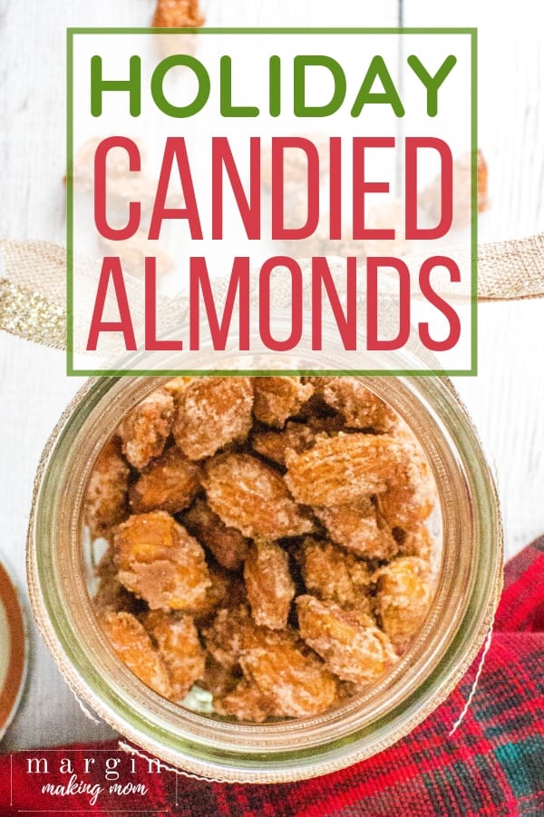glass jar of cinnamon sugar candied almonds made on the stovetop