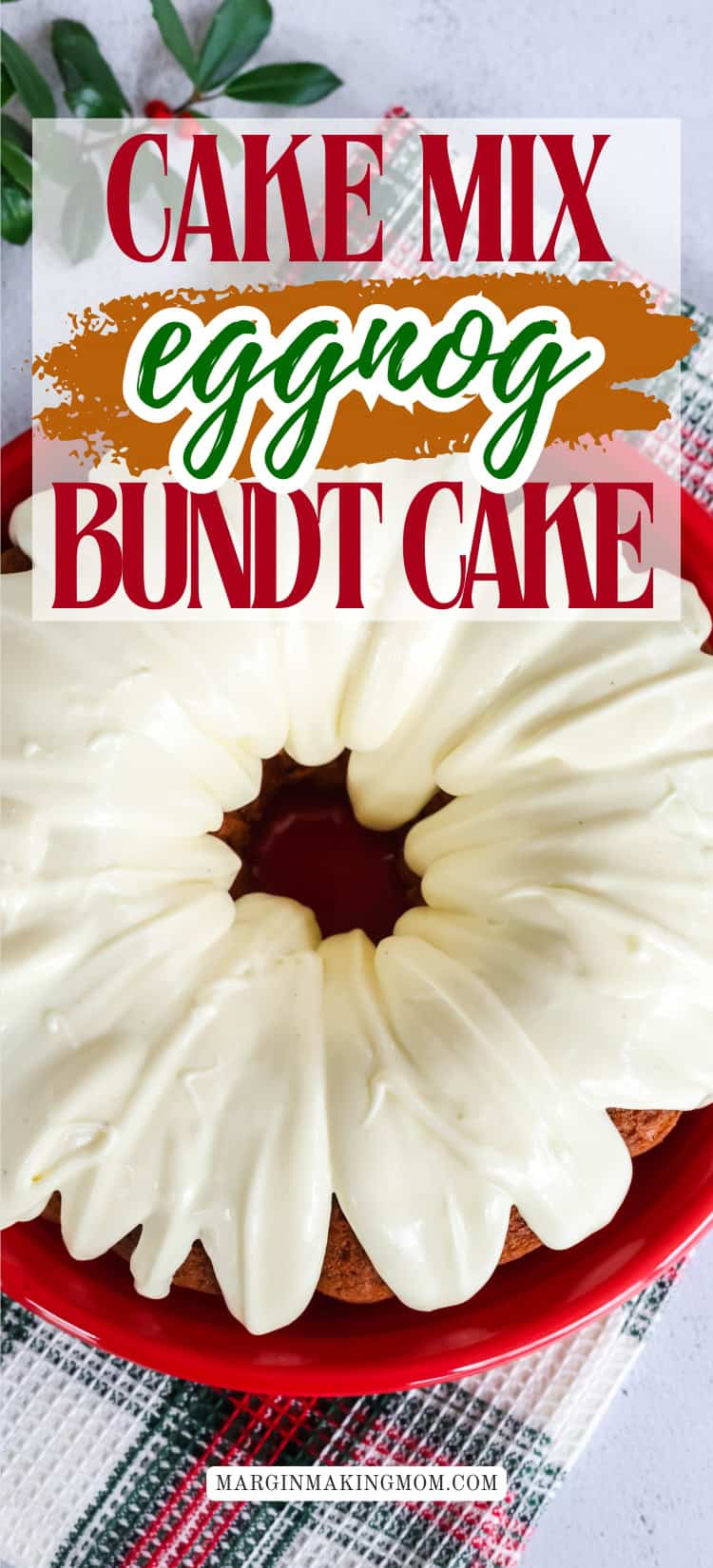 overhead view of an iced eggnog bundt cake on a red plate.