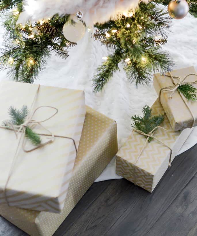 wrapped gifts under a christmas tree