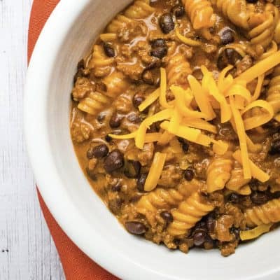 white bowl filled with enchilada pasta made in the instant pot