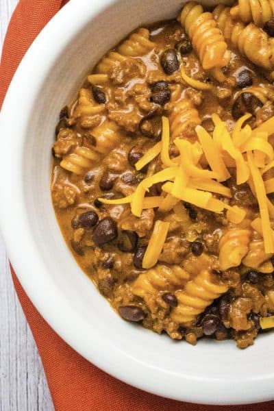 white bowl filled with enchilada pasta made in the instant pot