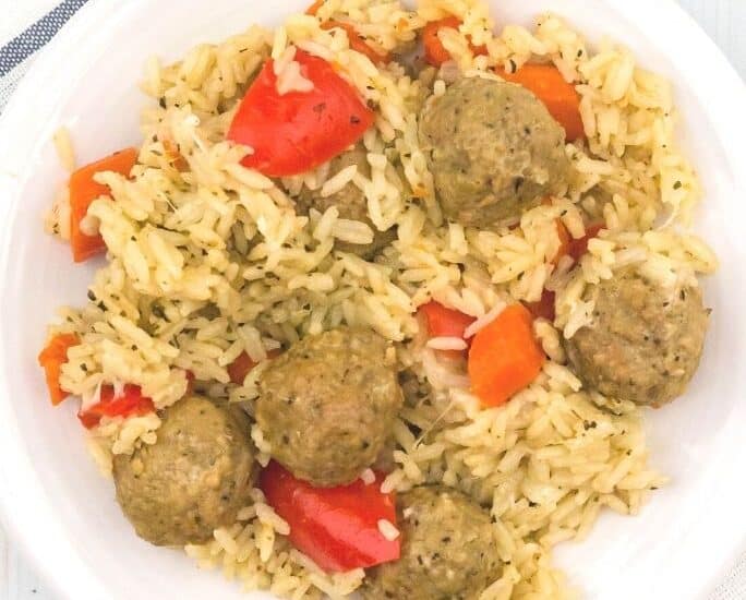 white plate serving Instant Pot meatballs and rice