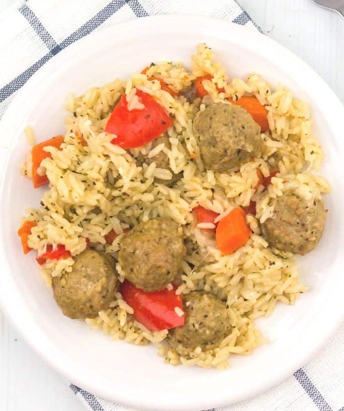 white plate serving Instant Pot meatballs and rice