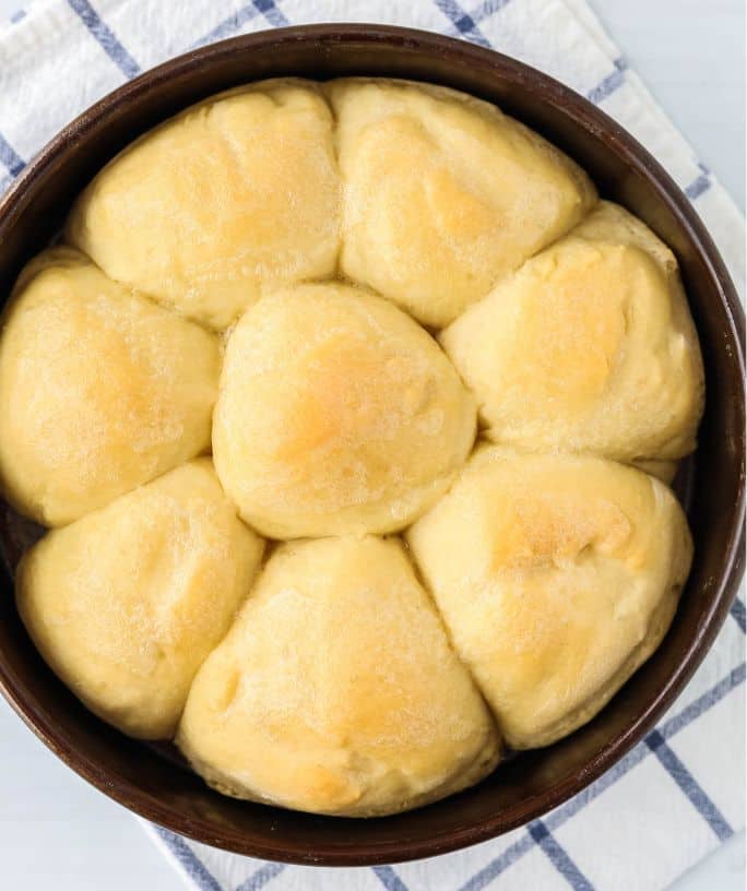 overhead view of a round pan of instant pot dinner rolls