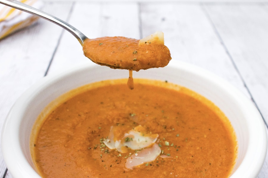 white bowl filled with Instant Pot tomato basil soup