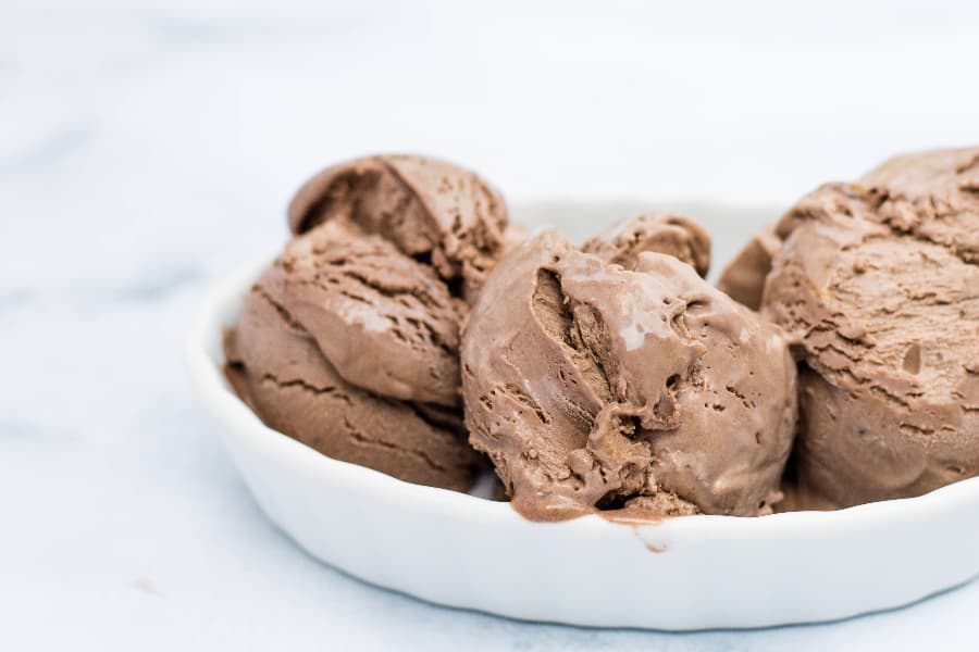 three scoops of homemade no-churn chocolate peanut butter ice cream made with sweetened condensed milk and heavy cream