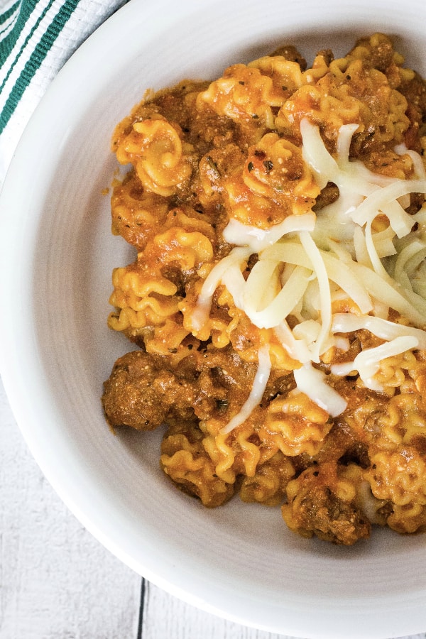 white bowl filled with Instant Pot lasagna casserole