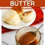 jar of pressure cooker apple butter next to a plate of biscuits