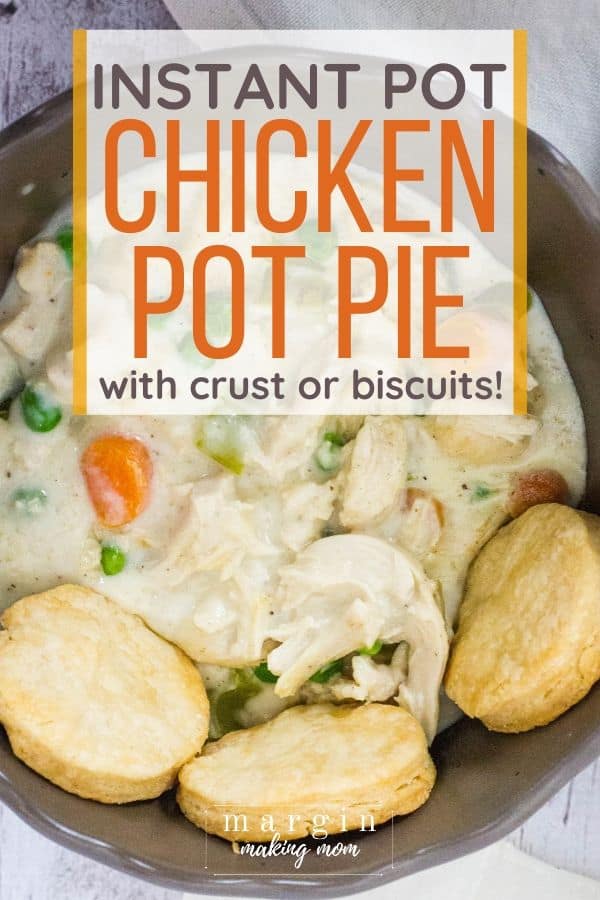 chicken pot pie filling cooked in the Instant Pot is served in a brown bowl with biscuits