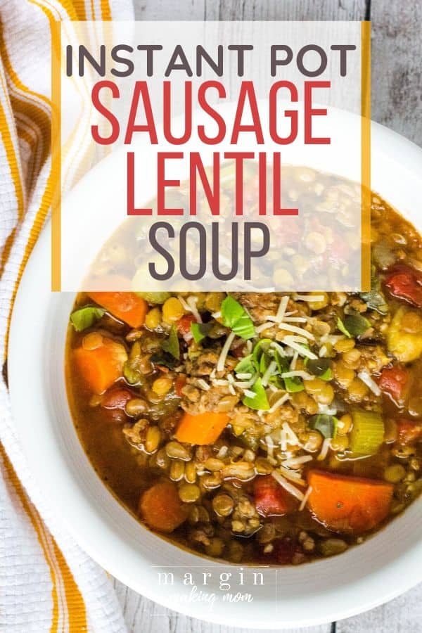 white bowl filled with sausage lentil soup cooked in the Instant Pot