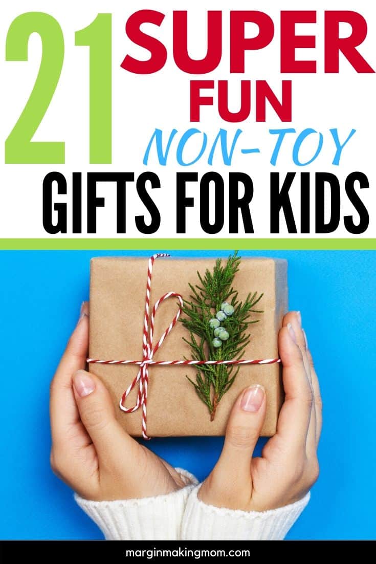 woman's hands holding a Christmas gift