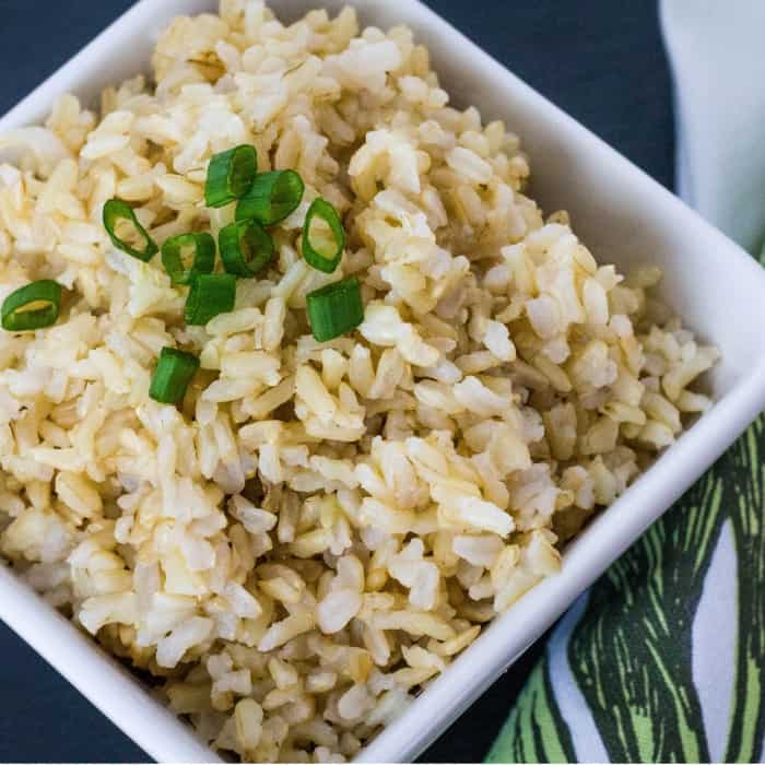 White bowl of brown rice cooked in the Instant Pot, as a good Instant Pot recipe for beginners