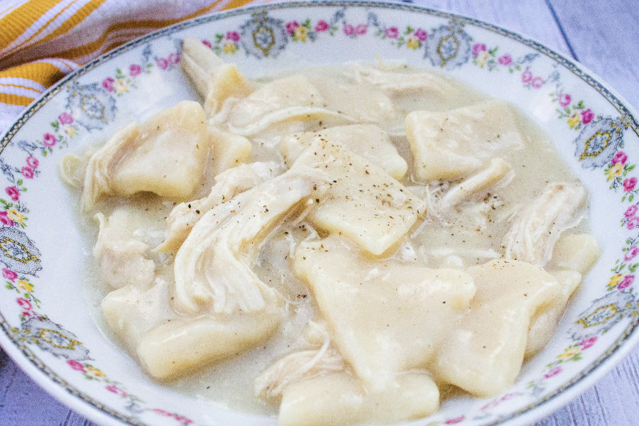 Copycat Cracker Barrel chicken and dumplings served in a China bowl