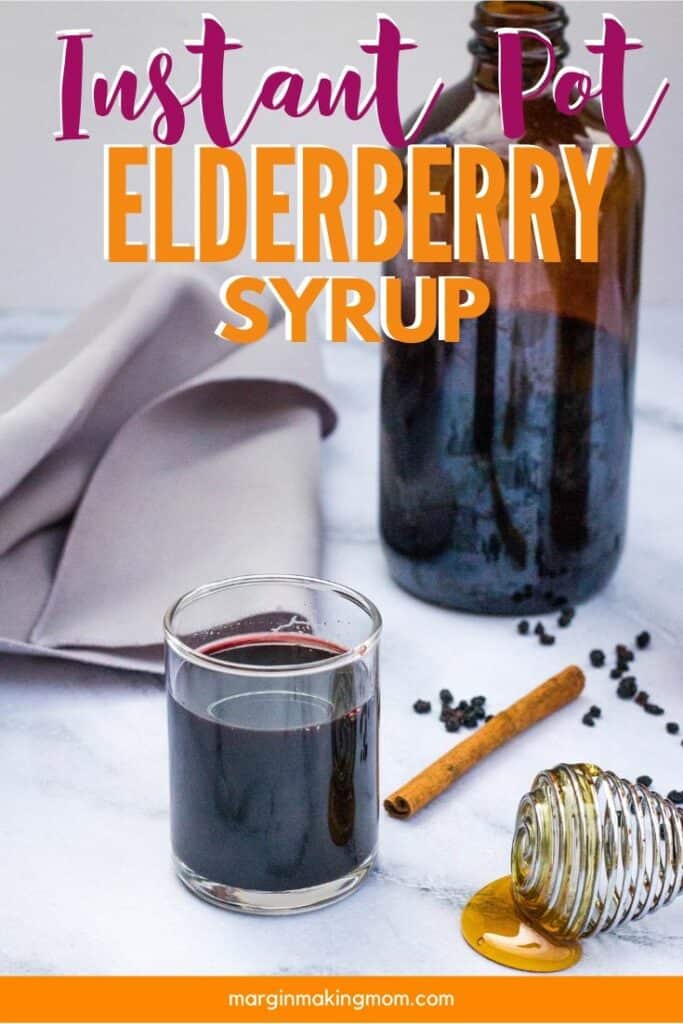 small glass of elderberry syrup that was prepared in the Instant Pot