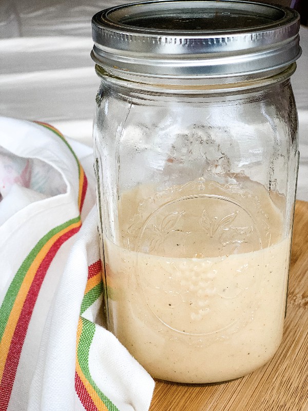glass jar filled with gluten free cream of chicken soup