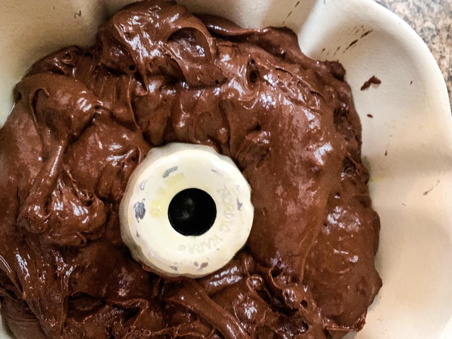 chocolate cake batter in a bundt pan