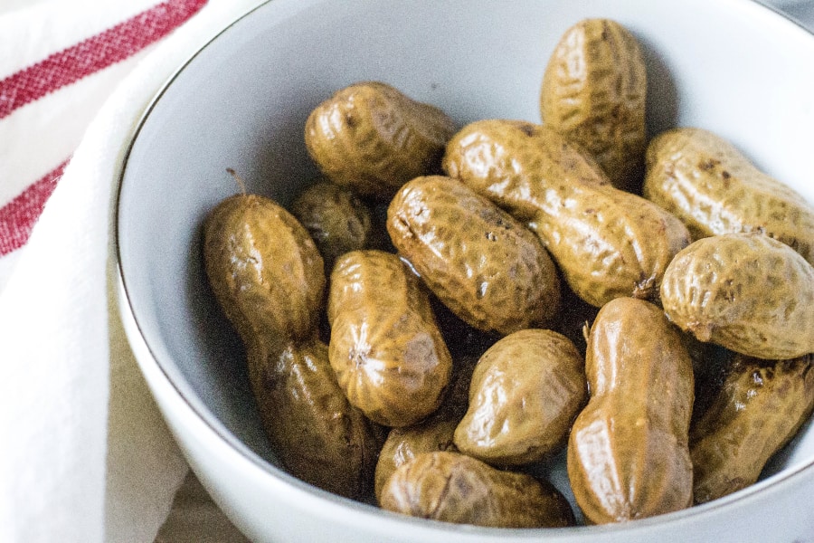 white bowl filled with boiled peanuts