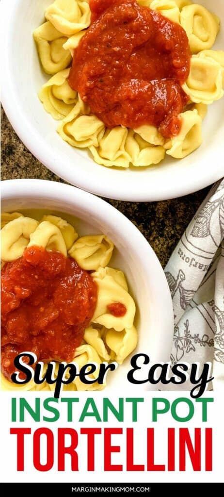 white bowl filled with Instant Pot tortellini topped with marinara sauce