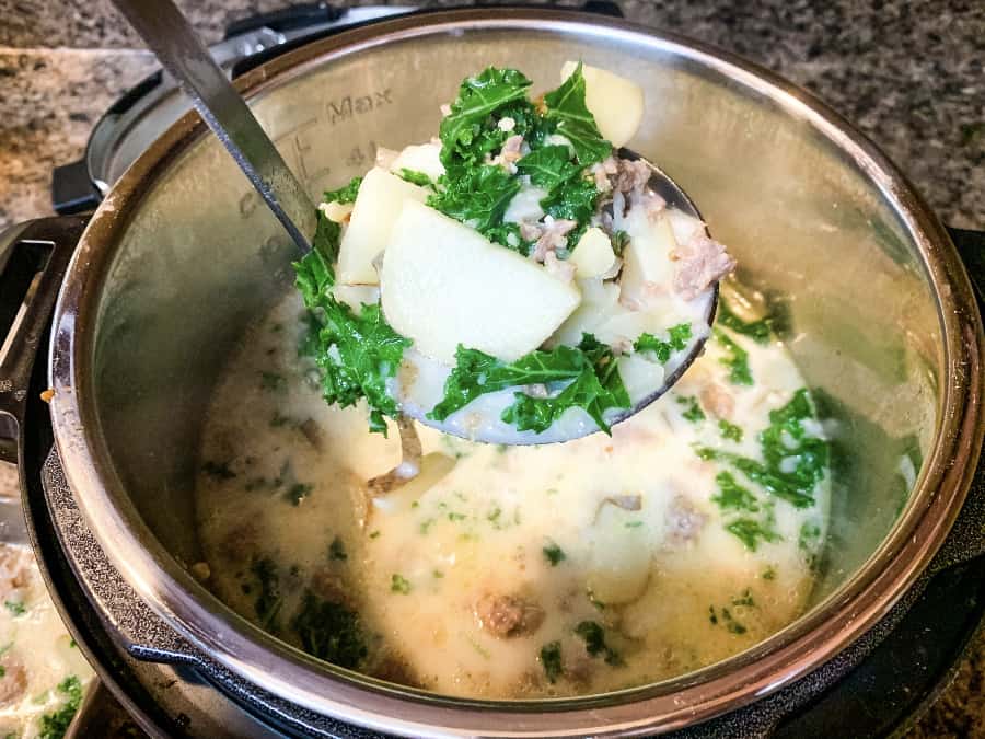 easy Whole30 zuppa toscana soup in the insert pot of the pressure cooker