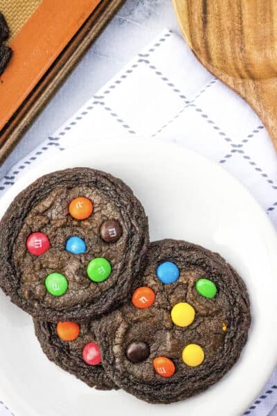 white plate with M&M brownie mix cookies