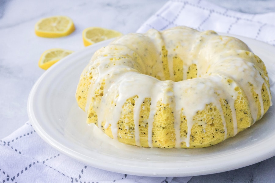 lemon bundt cake on a white plate