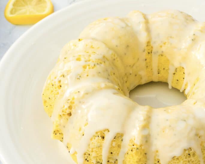 Instant Pot Lemon Poppy Seed Bundt Cake on a white plate