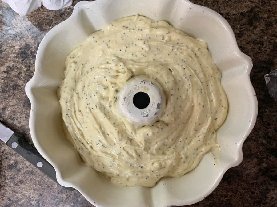 lemon poppy seed cake batter in a 6-cup bundt pan